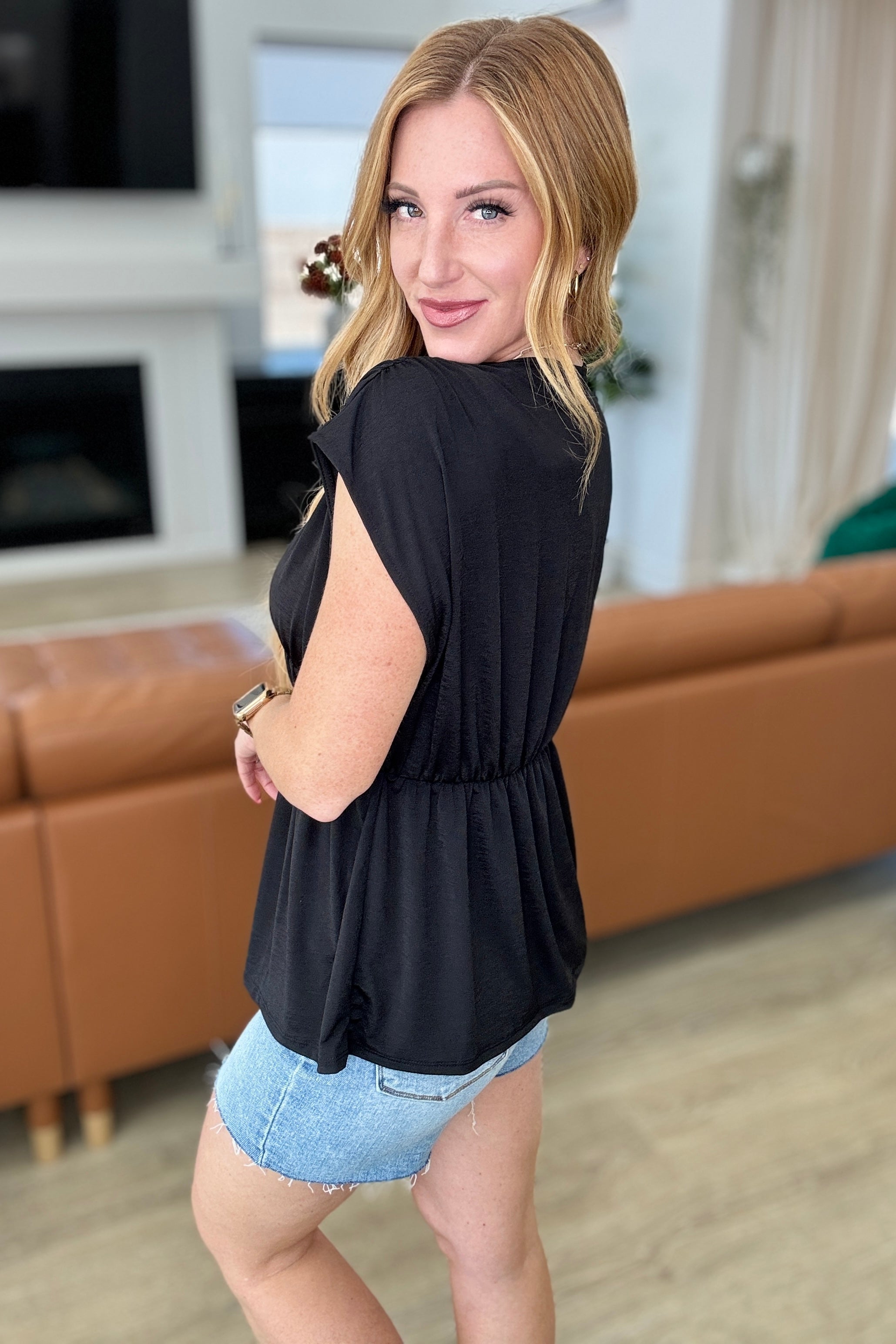 Rhea Peplum Top in Black