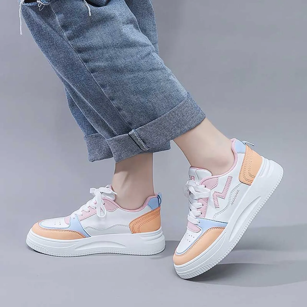 White pink pattern sewn accents shoe sneaker