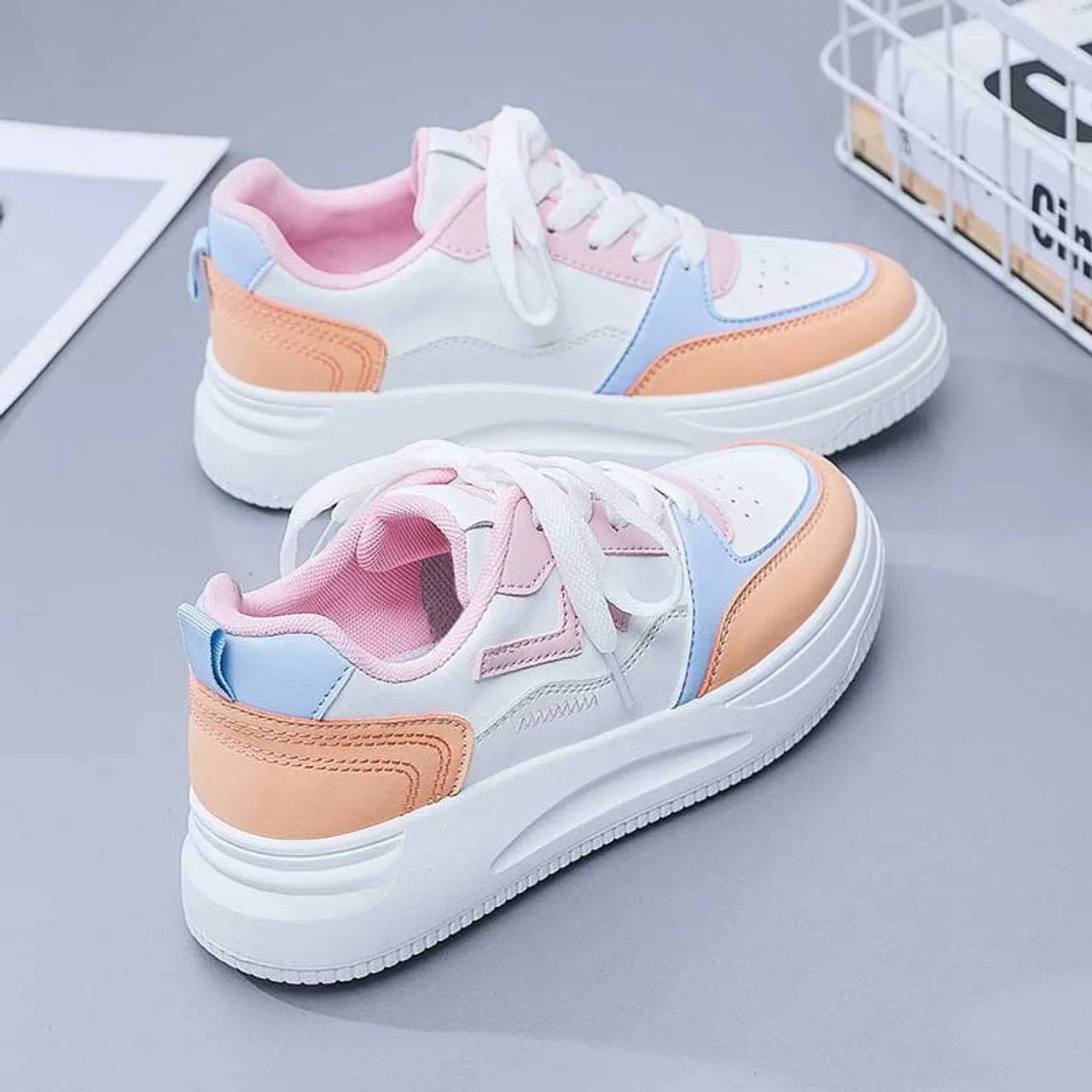 White pink pattern sewn accents shoe sneaker